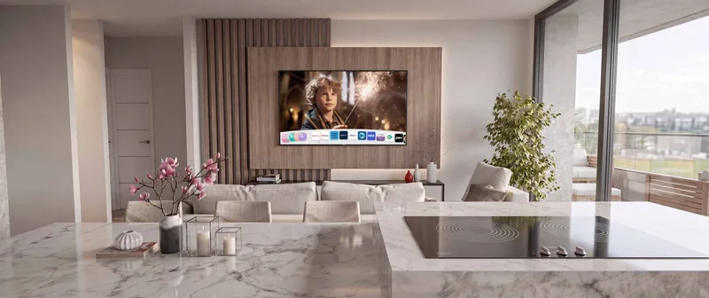 Cocina y sala integradas con isla central en un apartamento TR33